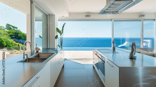 A minimalist kitchen with high-end stainless steel appliances and a stunning view of the ocean raw AI generated illustration © Olive Studio