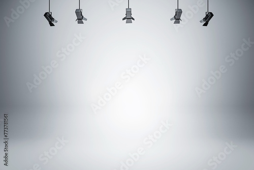 Professional studio setup with ceiling spotlights and clean white stage for product display. 3D Rendering photo