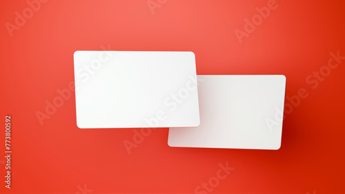 Two blank plastic business cards mockups set isolated on red background. Debit card mock up. Name card design mock up presentation.