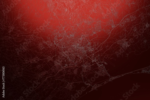 Street map of Montpellier (France) engraved on red metal background. Light is coming from top. 3d render, illustration photo
