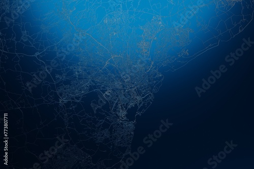 Street map of Cardiff (UK) engraved on blue metal background. View with light coming from top. 3d render, illustration photo