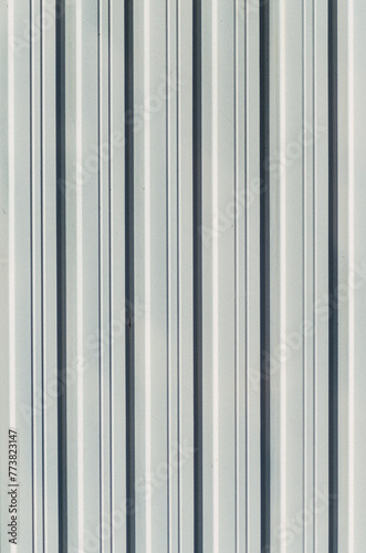 texture of a metallic colored corrugated metal door