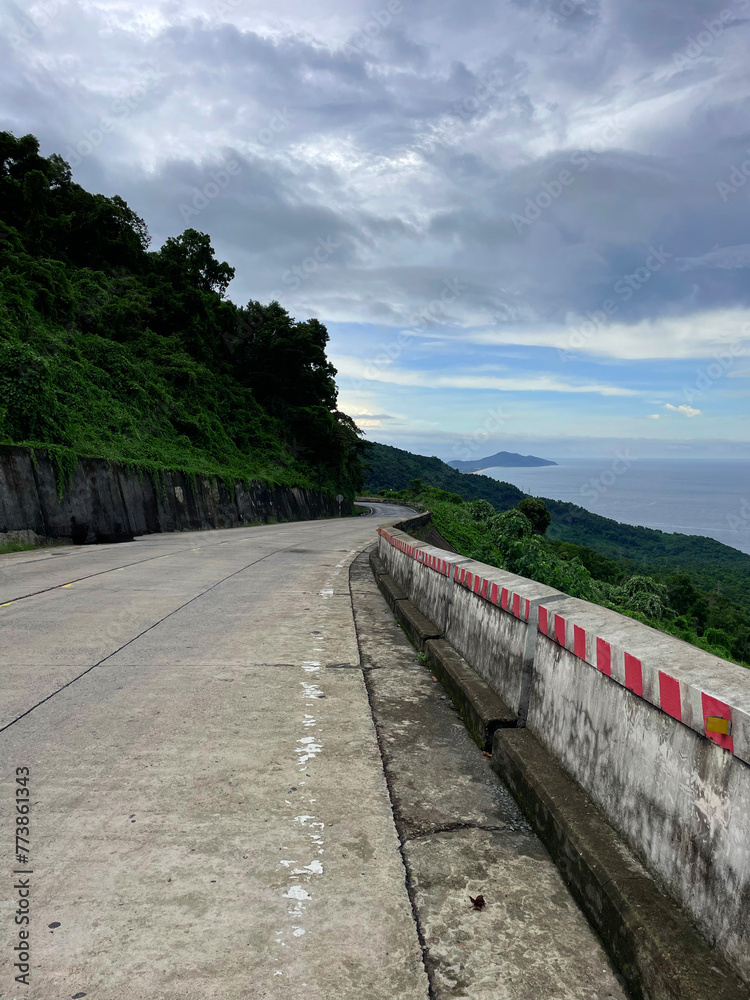 Fototapeta premium Road in the mountains. Serpentines. Beautiful road. Mountains. Route. Pass. Nature. Travel