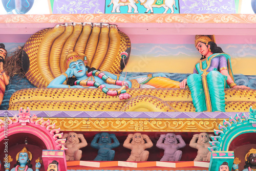 Tableau sur toile Maha Vishnu lies on the snake Anantashesha and Goddess Lakshmi sits at his feet