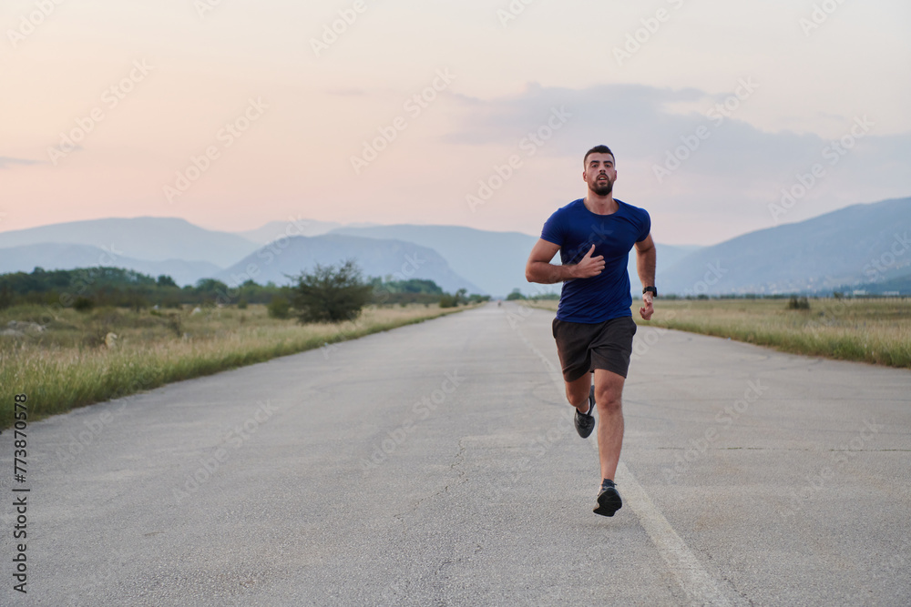 A dedicated marathon runner pushes himself to the limit in training. A dedicated marathon runner pushes himself to the limit in training.