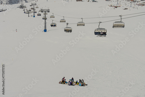 Ski, Snowboard freeride i deep powder snow. Gudauri Georgia Caucasus resort. Freeride in Caucasus mountains. Freeride snowboarding in winter. Heliboarding freeride. Riding in powder on snowborad. photo