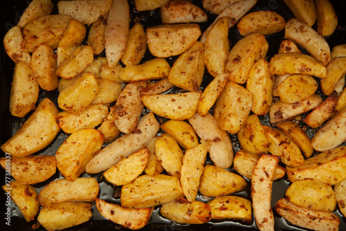 baked potatoes. Golden texture. Potatoes in the oven.