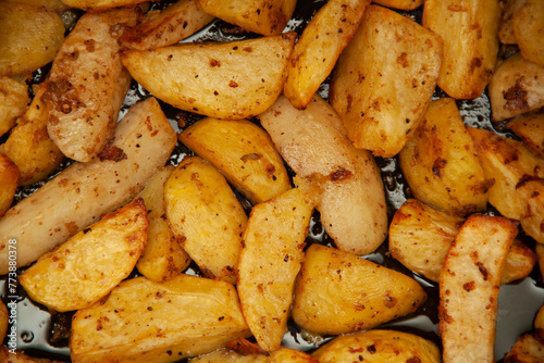 baked potatoes. Golden texture. Potatoes in the oven.