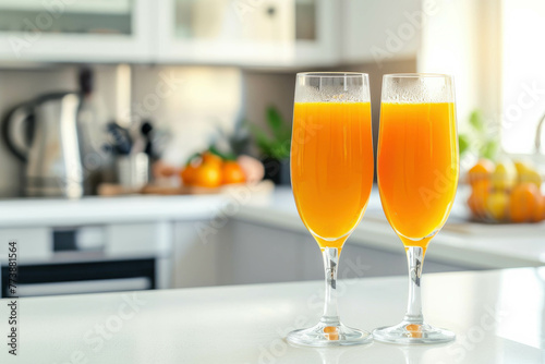 Start your day with a refreshing breakfast of appetizing sweet orange juice and two drinking glasses on a white kitchen table. Healthy light meals for breakfast, enhanced with AI generative. photo