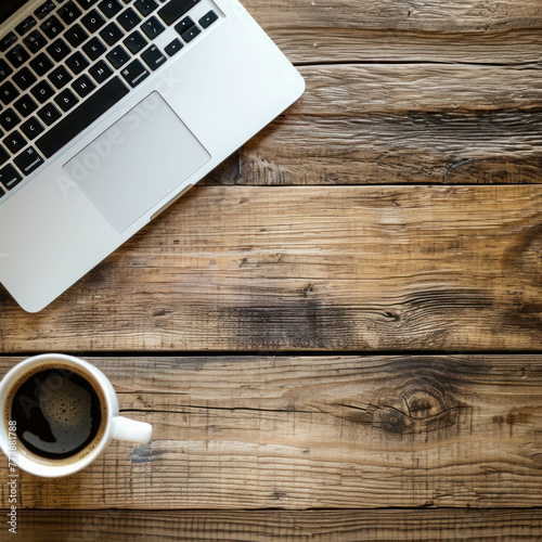 Experience productivity at its finest with a top-down view of a wooden tabletop adorned with a laptop and a steaming cup of coffee. Every detail is captured in this zoomed-in shot. AI generative. photo