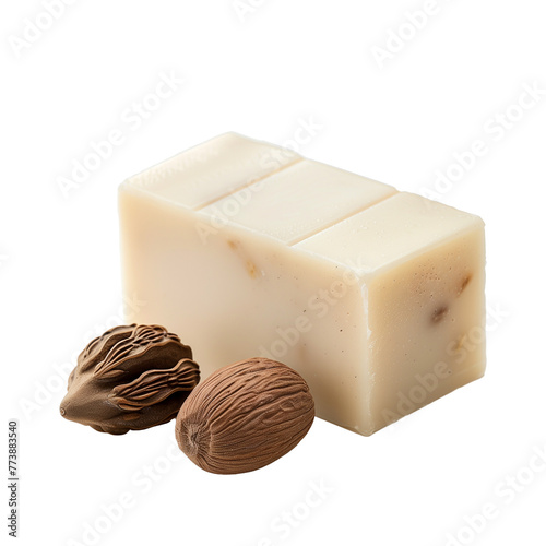 A close-up of a soap bar made from shea butter, with shea nuts beside it, illustrating the journey from nut to nourishment, isolated on transparent background
