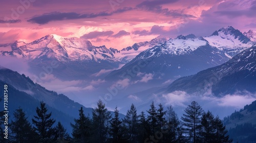 Landscape of snow-capped mountains, coniferous trees and an unusual lilac sky.a?'The concept for the development of tourism, mountaineering, skiing, rock climbing, excursions in the mountains photo