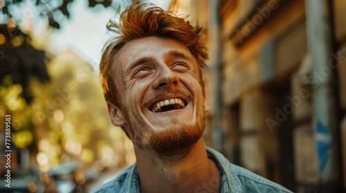 Happy Young Man. Portrait of a Smiling Guy Laughing Happily