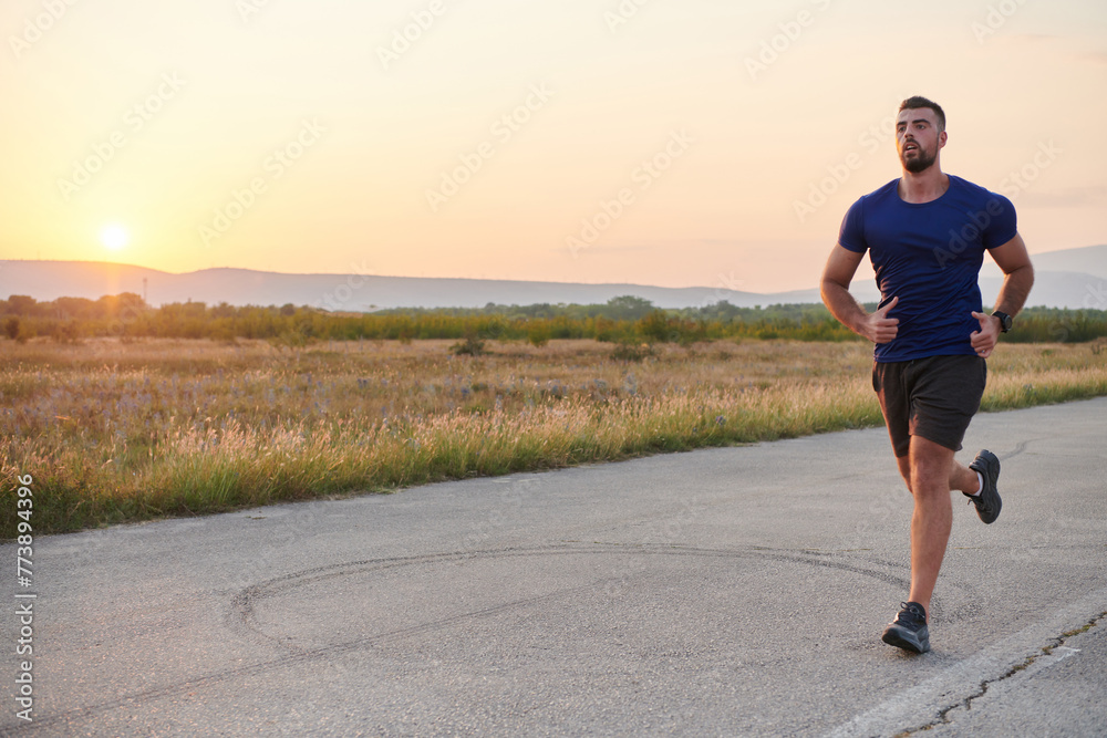 A dedicated marathon runner pushes himself to the limit in training. A dedicated marathon runner pushes himself to the limit in training.