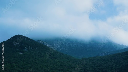 Time lapse of the Foehn effect on Mount Candina in Liendo. Liendo Valley, Eastern Coastal Mountain, Cantabrian Sea, Cantabria, Spain, Europe photo