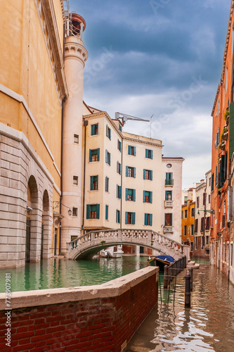 The acqua alta raises the water of a canal, in Venice, Veneto, Italy