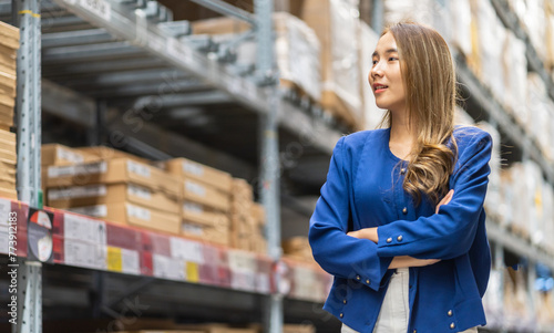 Female engineer is handling shipping and checking stock inventory in the warehouse with a tablet, industry, import-export, inventory management, logistics, global transportation at warehouse, business