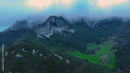 Aerial view from a drone of Monte Candina and the town of Liendo. Liendo Valley in the Eastern Coastal Mountains. Cantabrian Sea. Autonomous community of Cantabria, Spain, Europe photo