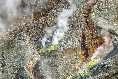 Active sulphur vents at Ōwakudani volcanic valley in Hakone, Kanagawa Prefecture, Japan. Steaming sulfur field near Mount Fuji. photo