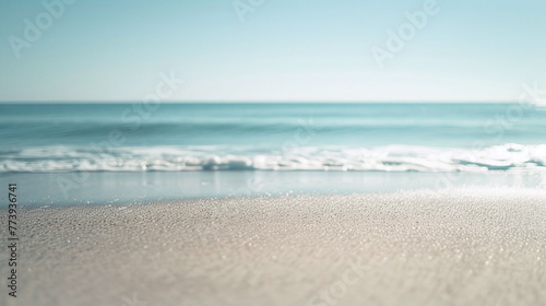 Serene beach landscape with clear blue sky and gentle waves  tropical summer backdrop. Vacation and relaxation concept for design and print. Wide scenic view with copy space