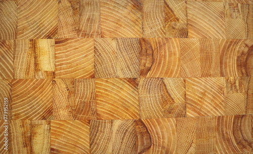 Oak wooden butcher chopping block, natural durable end grain hard wood board texture background pattern close up
