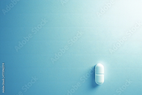 Pill on blue background, medicine concept