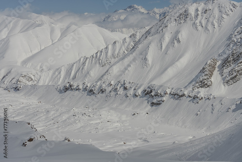 Aerial drone view of Gudauri ski resort in winter. Caucasus mountains in Georgia.  Kudebi, Bidara, Sadzele, Kobi aerial panorama in caucasus winter mountains. photo