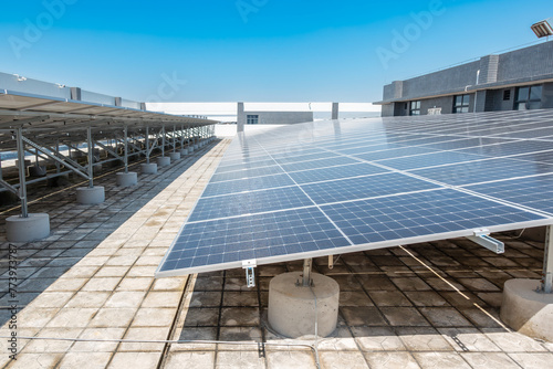 solar panels on the top floor of a building © Freer