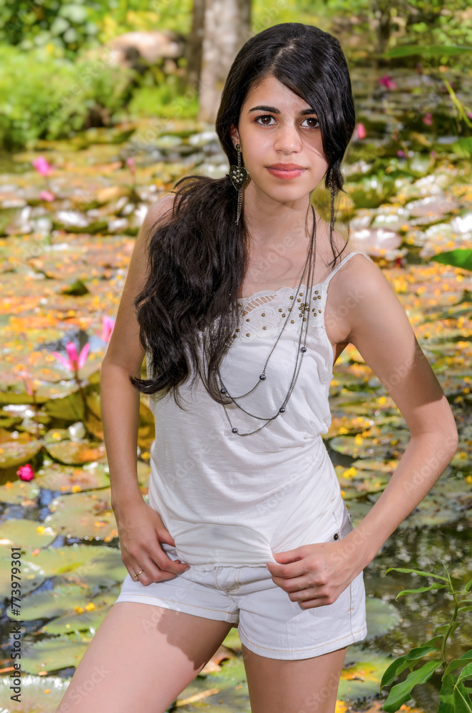 Outdoors portrait of a female teenager of Latin American ethnicity. Outdoors portrait of a female teenager of Latin American ethnicity.