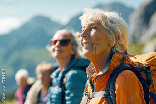 Active Mature senior people hiking in the mountains