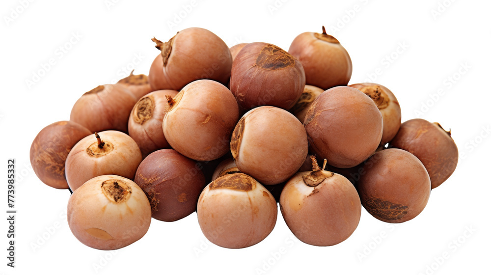 Obraz premium A pile of nuts balanced on top of each other, forming a towering stack