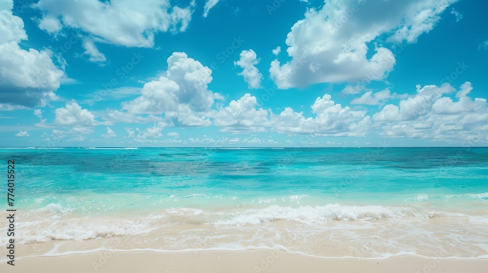 Beautiful tropical empty beach sea ocean with white cloud on blue sky background
