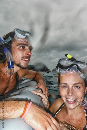 Boy and girl at sea with diving goggles and snorkel