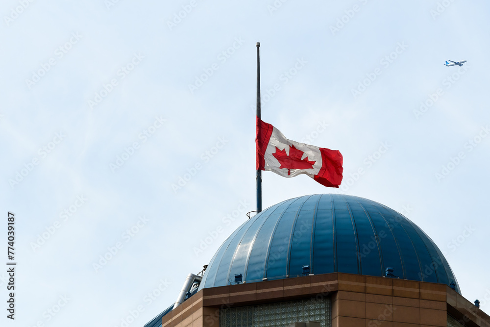 Fototapeta premium Canadian flag on building dome, Toronto, Canada