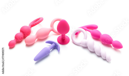 anal plugs and dildo sex toys isolated on white background © Nik_Merkulov
