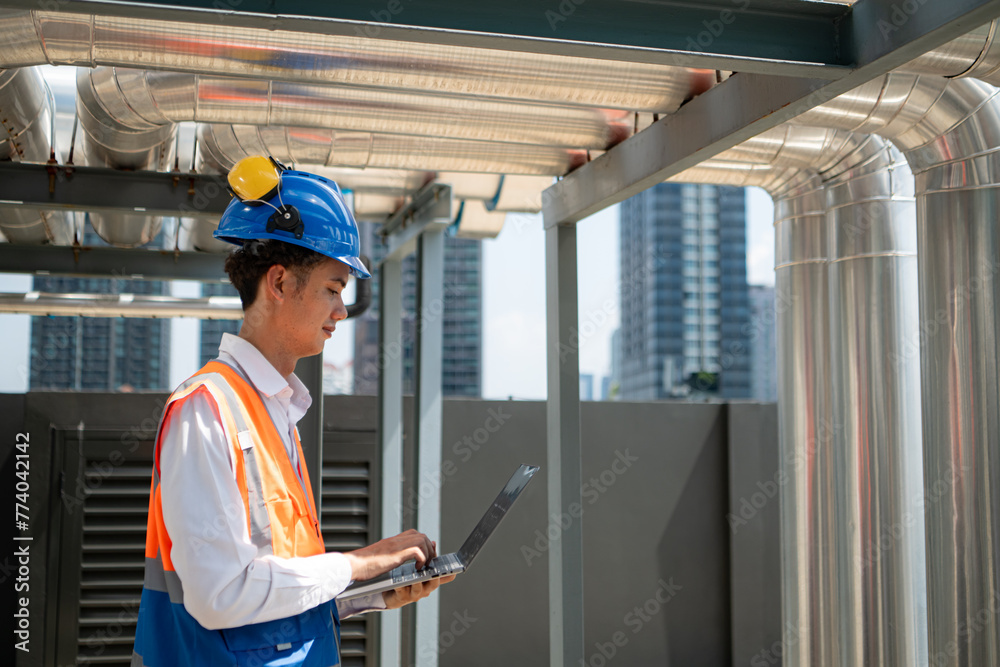 Engineers inspect the completed air conditioning and water systems to continue verifying their functionality. Engineers inspect the completed air conditioning and water systems to continue verifying their functionality.