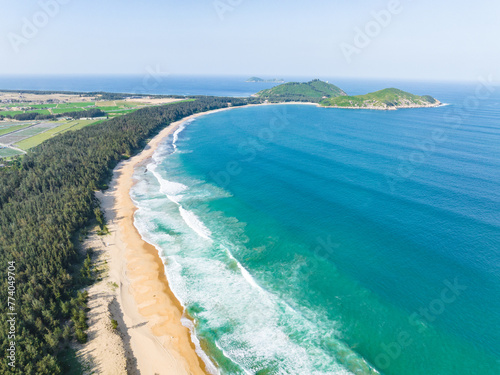 Aerial photography of the summer coastline of Dahuajiao, Wanning, Hainan, China © hu