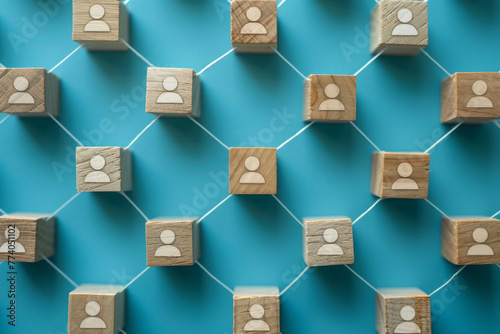 Connected Network of Wooden Blocks with People Icons on Blue Background