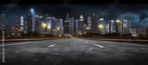 Empty side view asphalt with modern city skyline   night scene