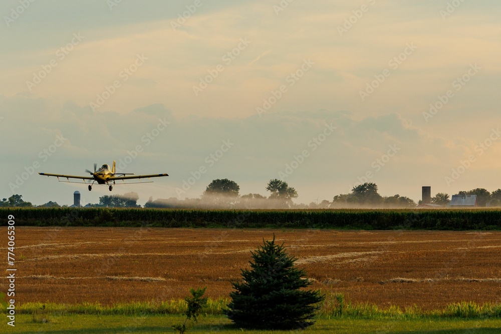 Crop duster in flight Crop duster in flight