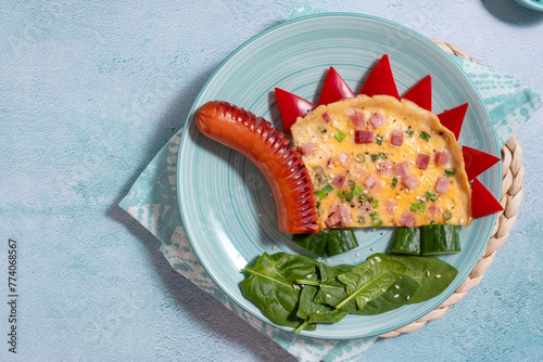 Cute dinosaur shaped omelet for kids breakfast