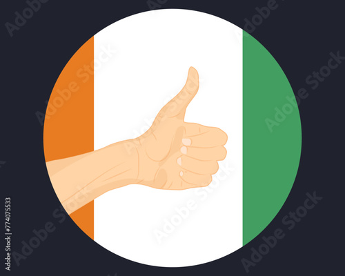 Hand approve sign with Ivory Coast flag, thumb up, approval or vote concept