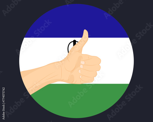 Hand approve sign with Lesotho flag, thumb up, approval or vote concept