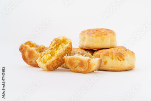 Multiple small mooncakes on white background