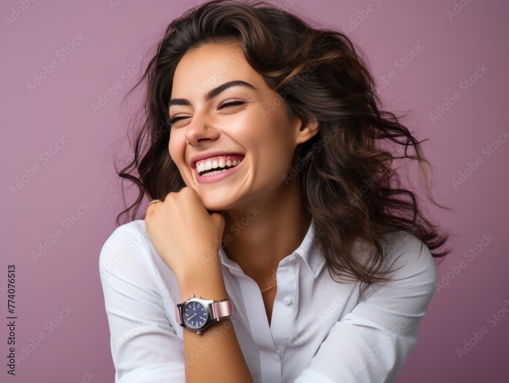 A woman is smiling and wearing a color clothing A woman is smiling and wearing a color clothing