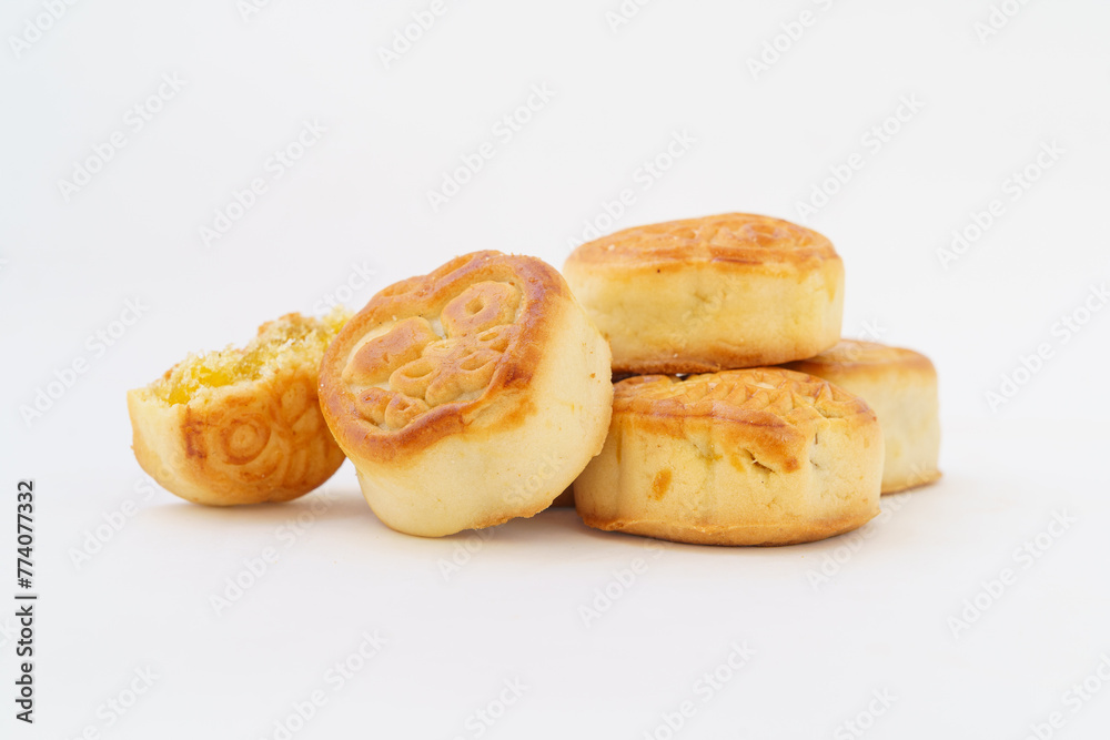 Multiple small mooncakes on white background