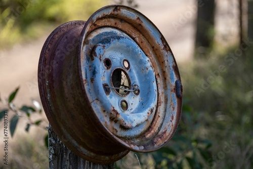 Old rusty stamped steel wheel