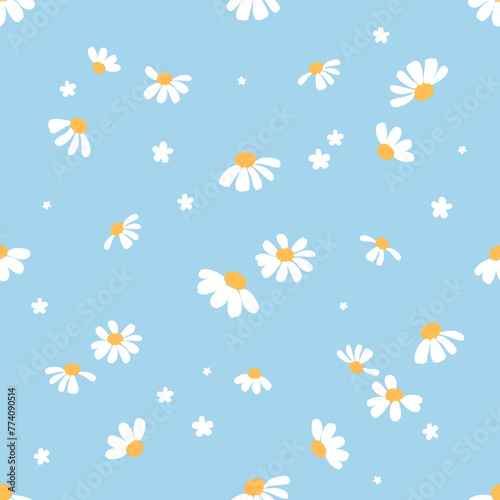 Seamless pattern with daisy flower on blue background vector. Cute floral print.