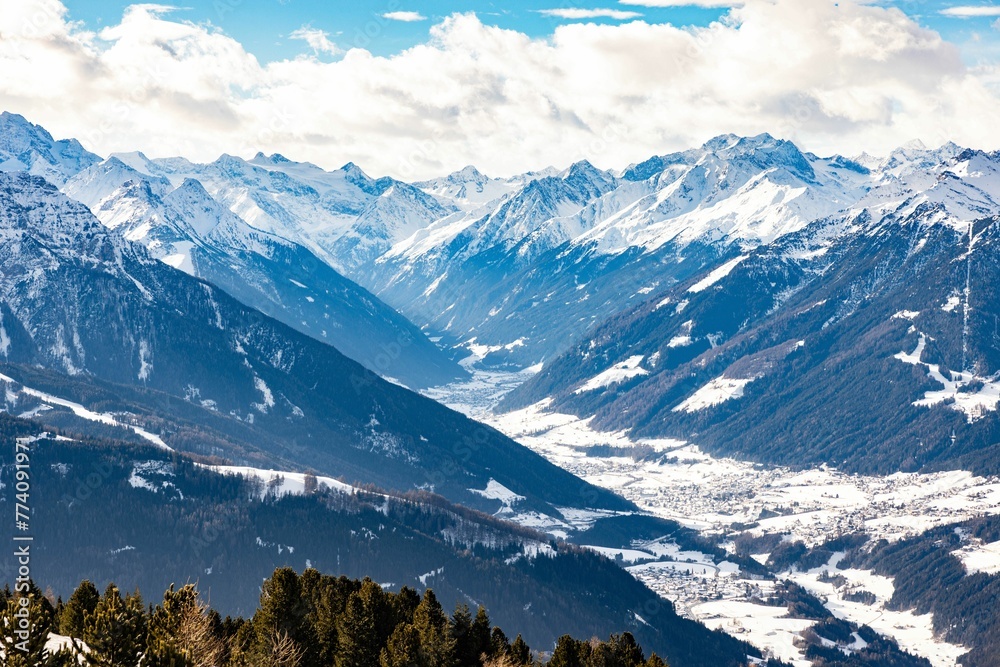 Landscape of the snowy Patscherkofel mountain on a sunny day in Innsbruck, Austria