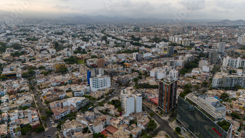 Aerial Drone view of Lima the capital city of Peru skyline, Mireflores Barranco morning traffic south america